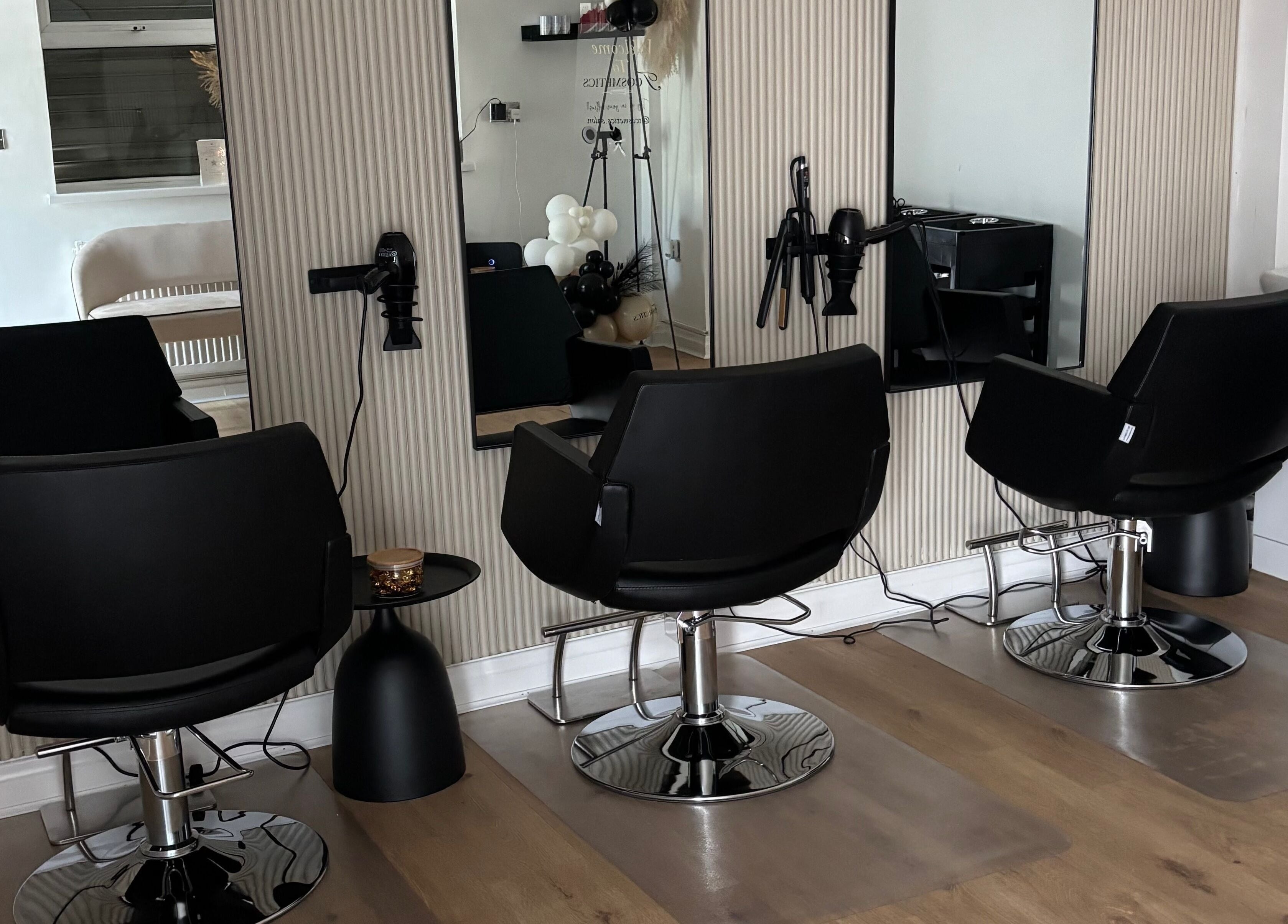 Modern salon chairs and mirrors at Tcosmetics in Swinton, England, GB offering premium beauty services.