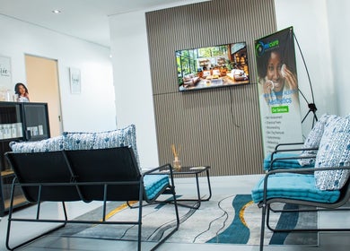 Cozy waiting area at Micure Aesthetics Clinic, Gaborone, Gaborone City, BW with stylish decor and seating.