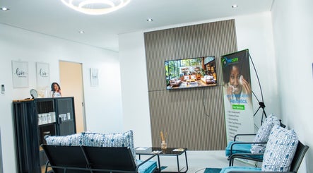 Modern waiting area at Micure Aesthetics Clinic, Gaborone, with stylish seating and decor.