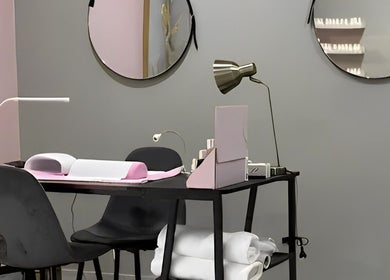 Modern manicure station at Apple Blossoms Beauty and Spa, Roodepoort, Gauteng, ZA, offering a serene atmosphere.