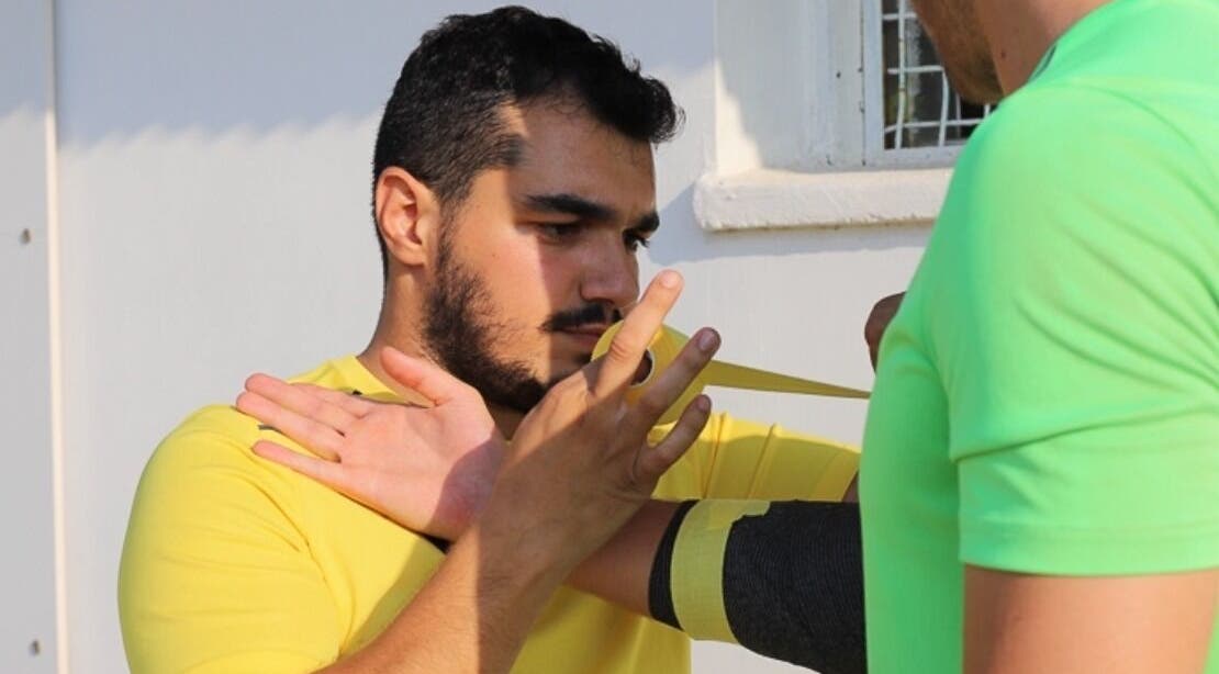 Therapist applying kinesiology tape at AC Physiotherapy, Lemesos, Lemesos, CY for muscle support.