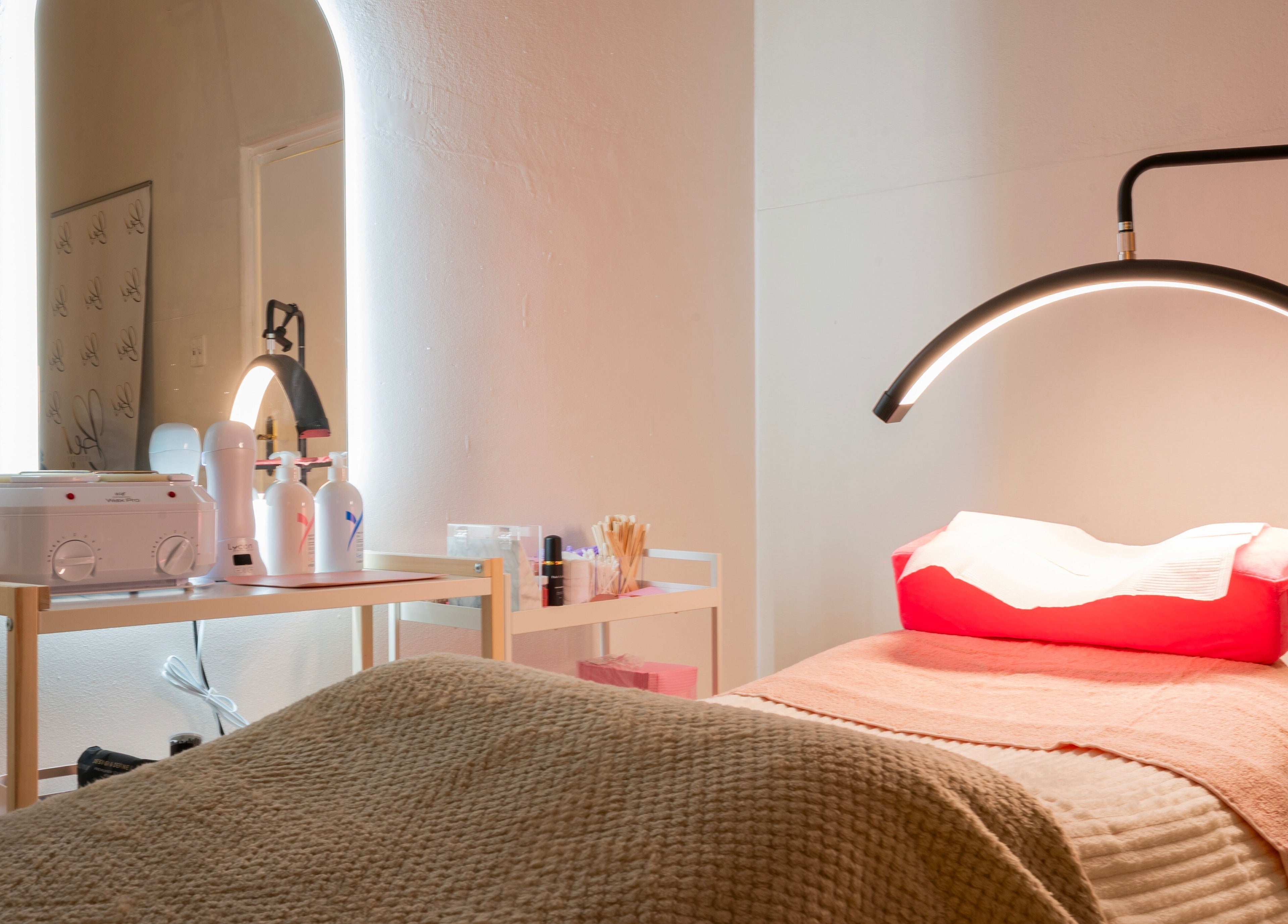 Relaxing spa room at Pretty Kitty, Mount Hawthorn, Western Australia, AU featuring a treatment bed and equipment.