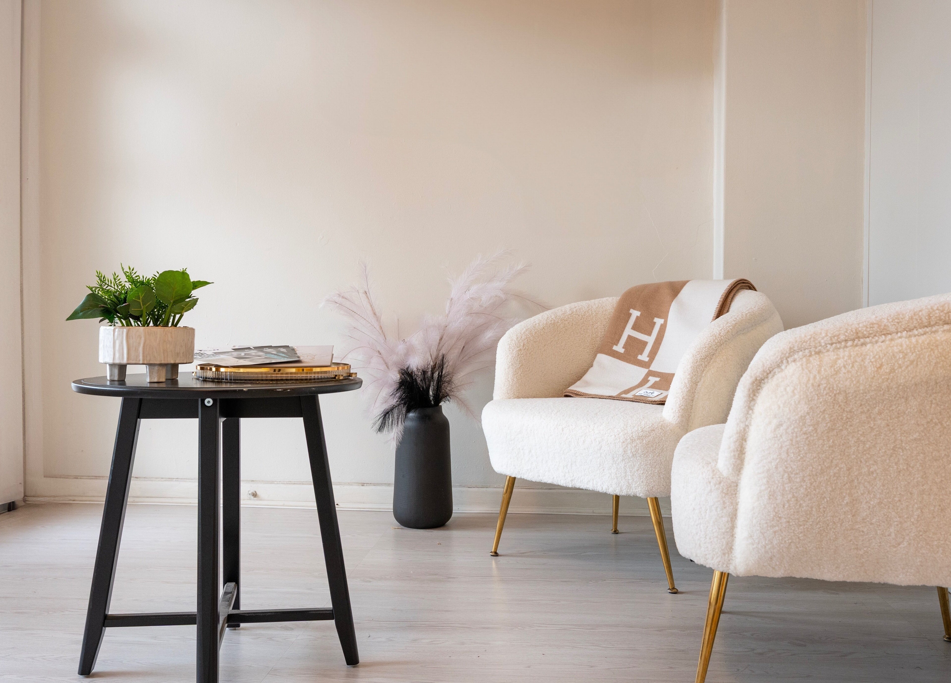 Elegant seating area at Pretty Kitty, Mount Hawthorn, Western Australia, AU. Features stylish chairs and decor.