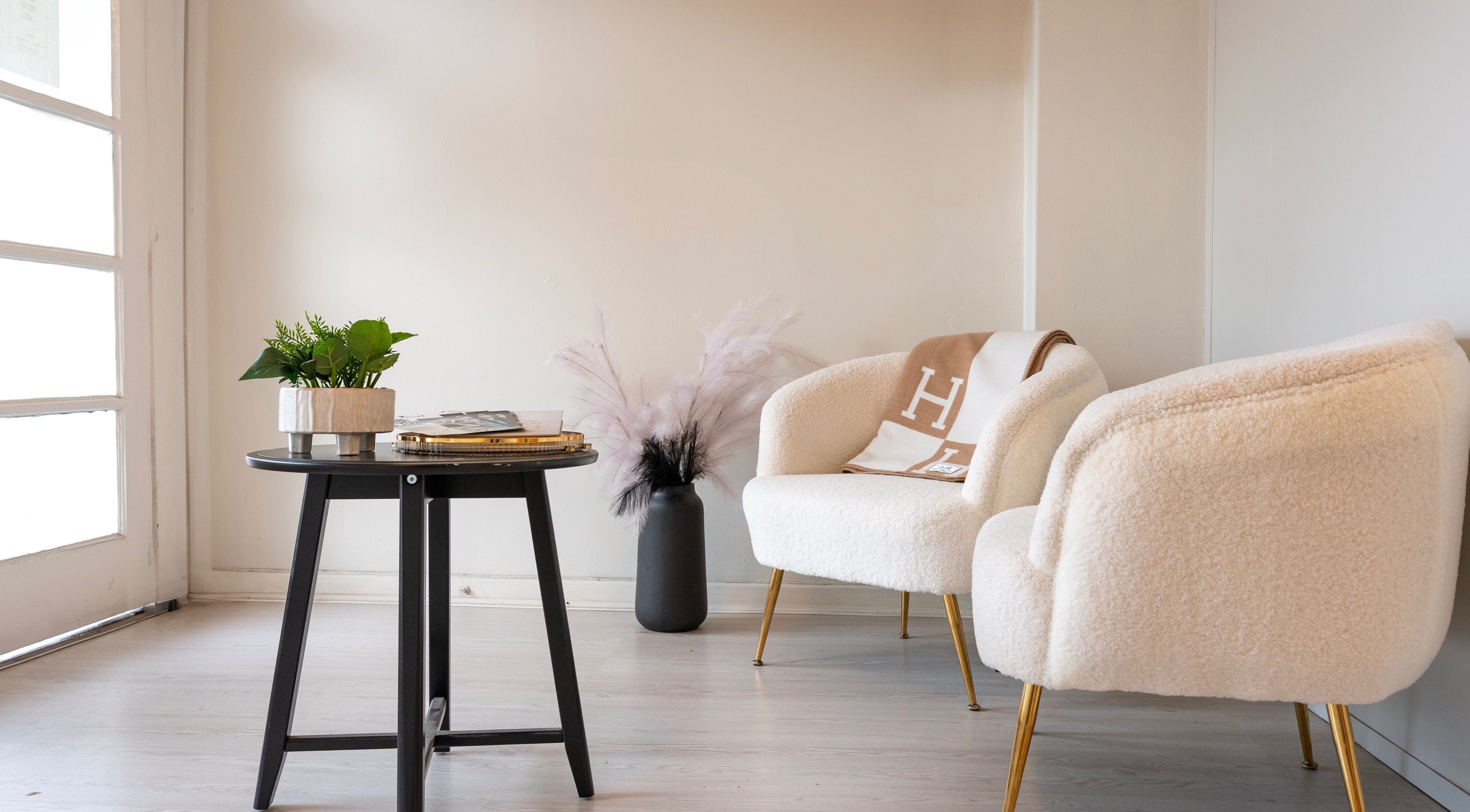 Elegant seating area at Pretty Kitty, Mount Hawthorn, Western Australia, AU. Features stylish chairs and decor.