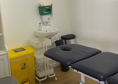 Clean therapy room at AF Sports Therapy in Birmingham, England, GB, featuring a treatment table and clinical supplies.