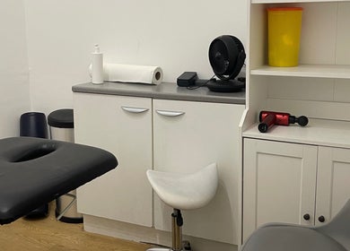 AF Sports Therapy room featuring massage table and therapy tools in Birmingham, England, GB.