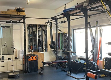 AF Sports Therapy gym interior featuring workout equipment in Birmingham, England, GB.