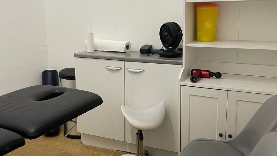 AF Sports Therapy treatment room featuring massage table and equipment in Birmingham, England, GB.