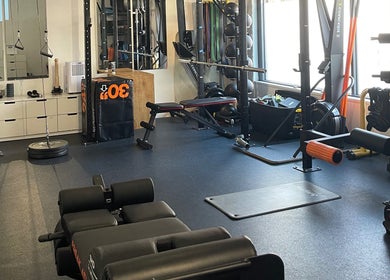 State-of-the-art gym at AF Sports Therapy in Birmingham, England, GB, featuring premium fitness equipment.