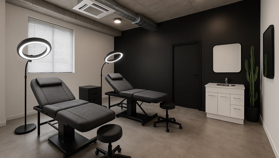 Modern beauty treatment room at Pink Cloud Studio, Dee Why, New South Wales, AU with sleek furnishings and lighting.