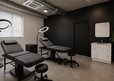 Modern beauty treatment room at Pink Cloud Studio, Dee Why, New South Wales, AU with sleek furnishings and lighting.