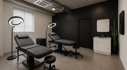 Modern beauty treatment room at Pink Cloud Studio, Dee Why, New South Wales, AU with sleek furnishings and lighting.