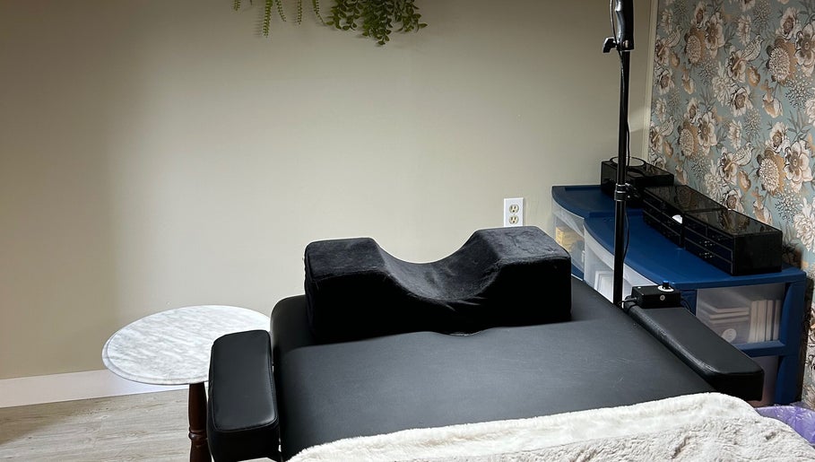 Tranquil lash treatment room at Lashes by Abbey, Simcoe, Ontario, CA, featuring a black treatment bed.