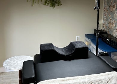 Tranquil lash treatment room at Lashes by Abbey, Simcoe, Ontario, CA, featuring a black treatment bed.