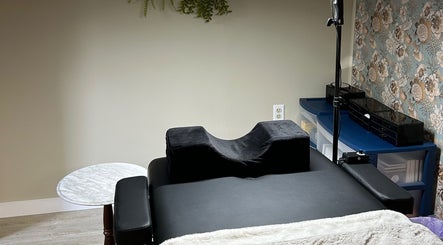 Tranquil lash treatment room at Lashes by Abbey, Simcoe, Ontario, CA, featuring a black treatment bed.
