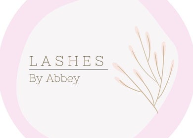 Delicate logo of Lashes by Abbey, Simcoe, Ontario, CA, featuring soft pink and branch design.