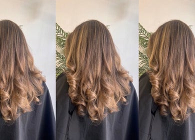 Voluminous curls styled at Hair by Zara Hinde in Glasgow, Scotland, GB, showcasing expert hair design.