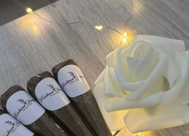 Beautiful henna cones with a white rose at henna.nkk, London, England, GB.