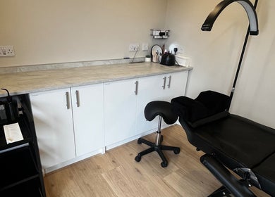 Modern treatment room at Studio Twenty Seven in Clevedon, England, GB with sleek design and relaxing chair.