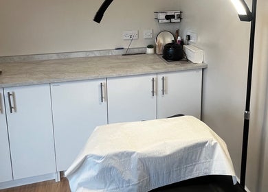 Studio Twenty Seven treatment room with a massage table in Clevedon, England, GB.