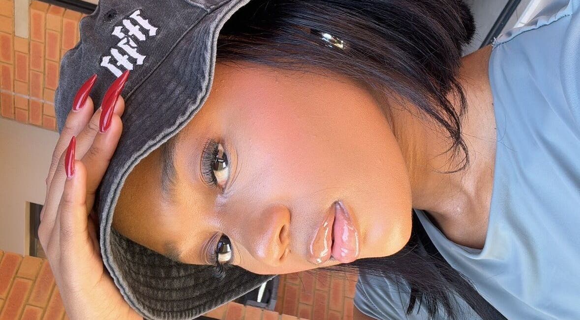 Close-up of a glamorous person at RSK Beauty, featuring sleek style in Mbombela, Mpumalanga, ZA.