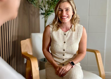 Smiling person in a welcoming chair at Nutritionally, Liverpool, England, GB.