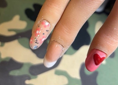 Beautiful nail art with glitter at NJK beauty, Shirebrook, England, GB.