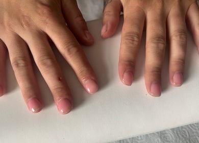 Beautiful manicured hands at NJK beauty, Shirebrook, England, GB showcasing the latest nail trends.