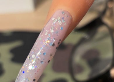Close-up of glittery nail art at NJK beauty, Shirebrook, England, GB.