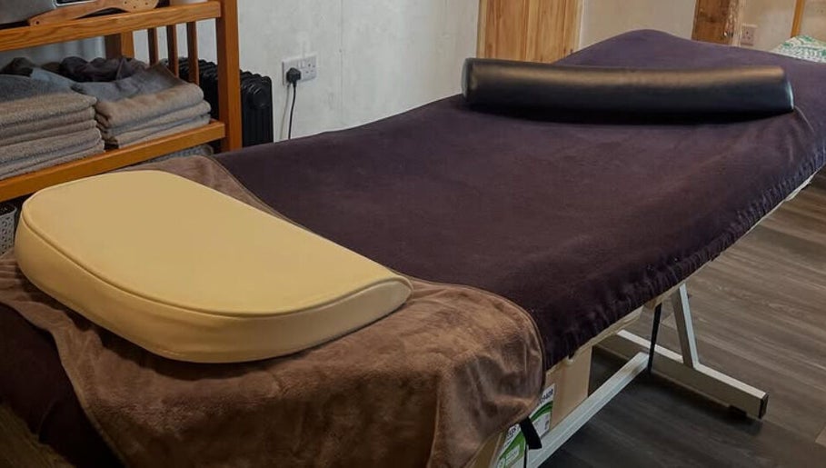 Massage table at Marie’s Sports and Wellbeing Massage, Porthleven, England, GB, ready for relaxation.