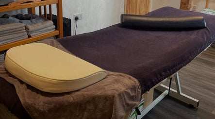 Massage table at Marie’s Sports and Wellbeing Massage, Porthleven, England, GB, ready for relaxation.