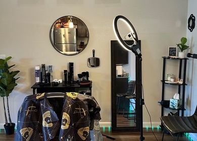 Modern salon setup at Habesha Blendz, Portland, Oregon, US, showcasing styling area and professional equipment.