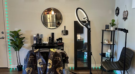 Modern salon setup at Habesha Blendz, Portland, Oregon, US, showcasing styling area and professional equipment.