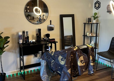 Stylish salon interior at Habesha Blendz, Portland, Oregon, US, showcasing modern design and hair styling tools.