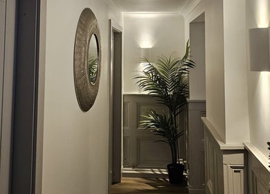 Calming hallway at York Medical Aesthetics and Massage, York, England, GB, with elegant decor and soft lighting.