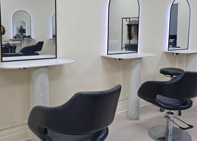 Modern salon chairs and mirrors at Crystal Hair Adelaide, Parkside, South Australia, AU offering premium hair services.
