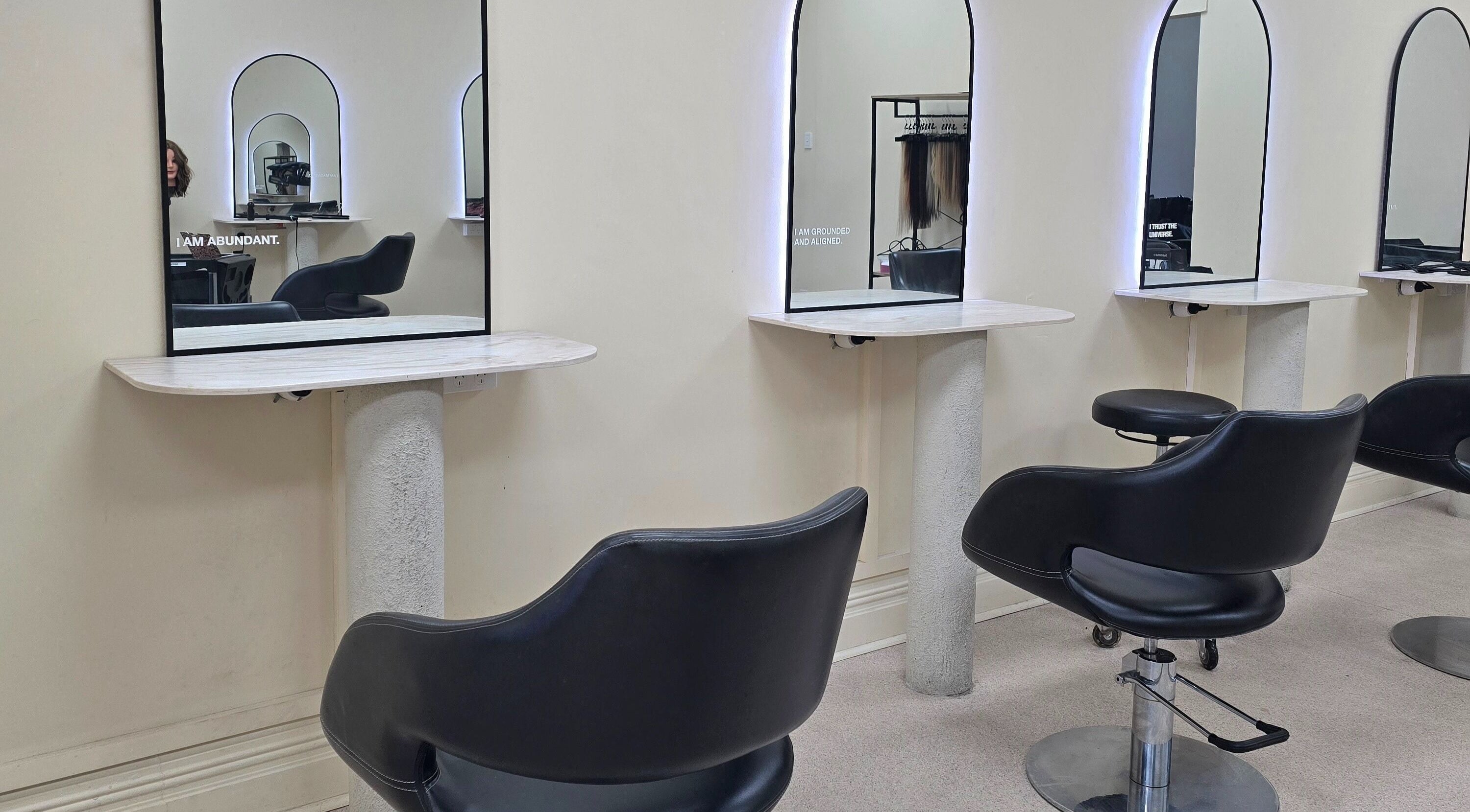 Modern salon chairs and mirrors at Crystal Hair Adelaide, Parkside, South Australia, AU offering premium hair services.