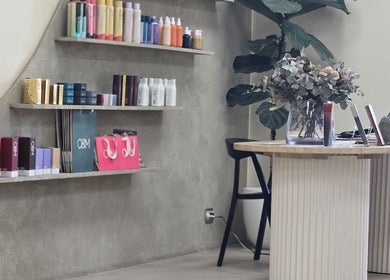 Product shelves and reception at Crystal Hair Adelaide in Parkside, South Australia, AU.