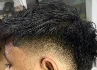 Close-up fade haircut at MFIX BARBER HOUSECALL, Rawang, Selangor, MY, showcasing styling expertise.