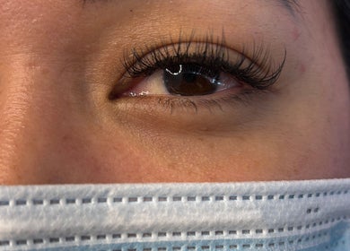 Close-up of eye with stylish lashes at Lash 'N' Wink Essence, Surrey, British Columbia, CA.