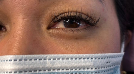 Close-up of eye with stylish lashes at Lash 'N' Wink Essence, Surrey, British Columbia, CA.