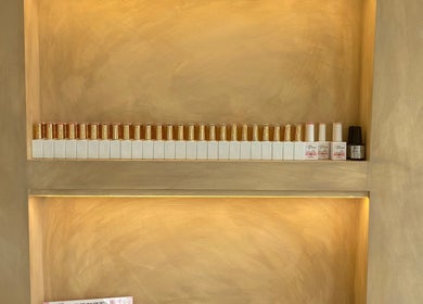 Polished shelf with beauty products at Sugaplum Studio, Albion, Queensland, AU.