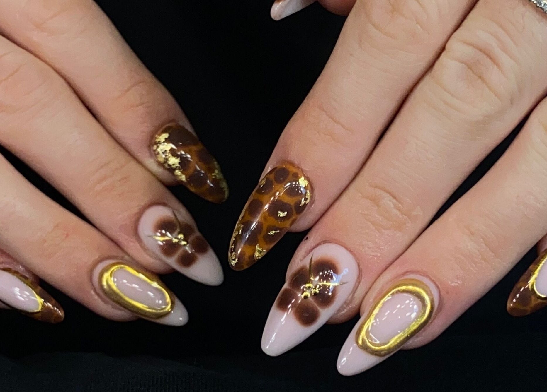 Elegant patterned nail art from Sugaplum Studio, Albion, Queensland, AU showcasing unique designs.