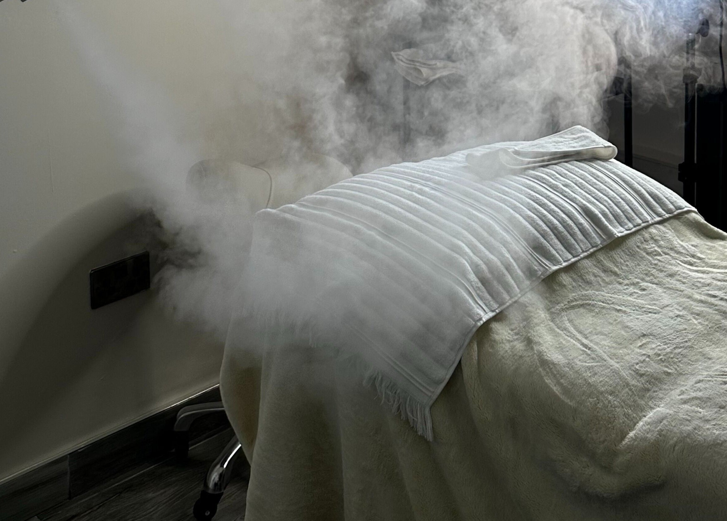 Steam room at Rhianne Orla Skin, Broxburn, Scotland, GB. A spa bed with steam for relaxation.