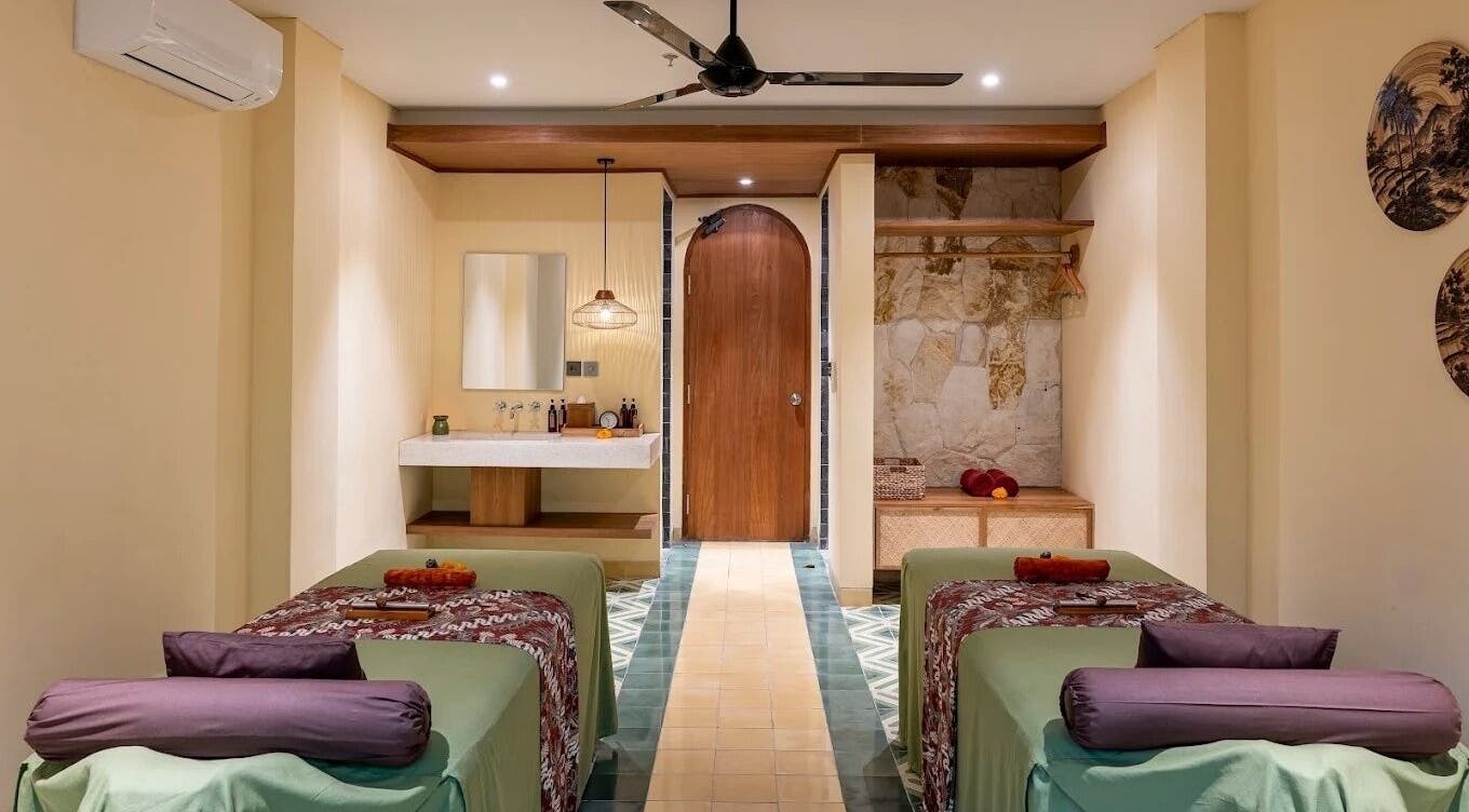 Relaxing treatment room at Tejas Spa at Adiwana Suweta, Bali, Bali, ID with twin massage tables and calming decor.