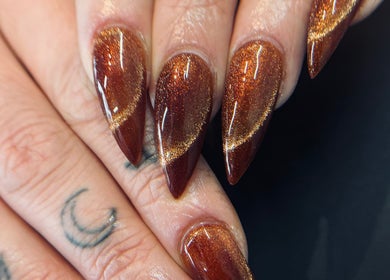 Elegant brown glitter nails at HABE BEAUTY, Kangaroo Flat, Victoria, AU, showcasing exquisite nail art.