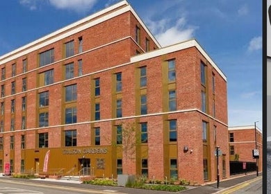 Supremebeautyworks in Coventry, England, GB features a modern red brick exterior.