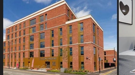 Supremebeautyworks in Coventry, England, GB features a modern red brick exterior.