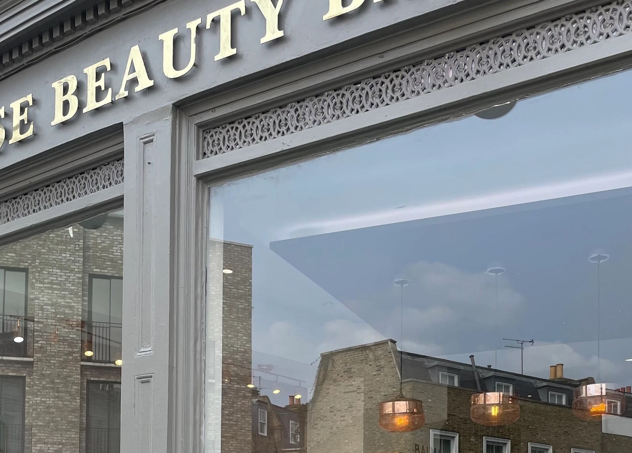 View of Hair By Radoushka storefront in London, England, GB with elegant signage.
