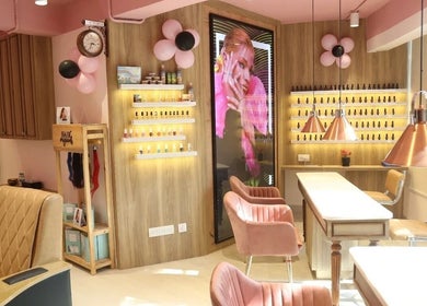 Elegant interior of Nails n Beyond Cathedral in Chennai, Tamil Nadu, IN with stylish seating and modern decor.